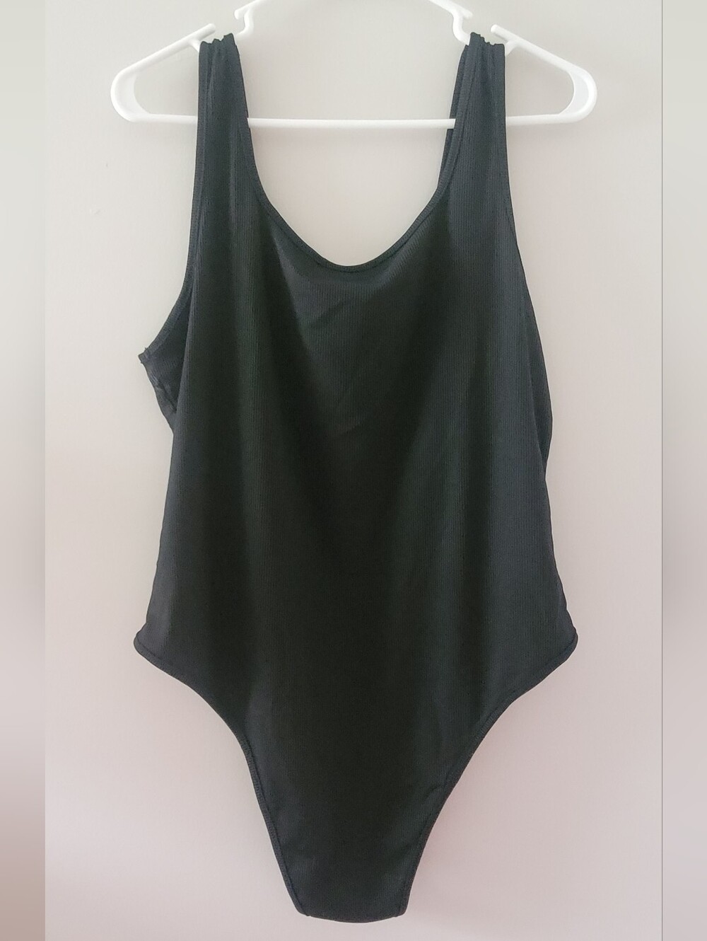 Classic Black Ribbed One-Piece Bodysuit